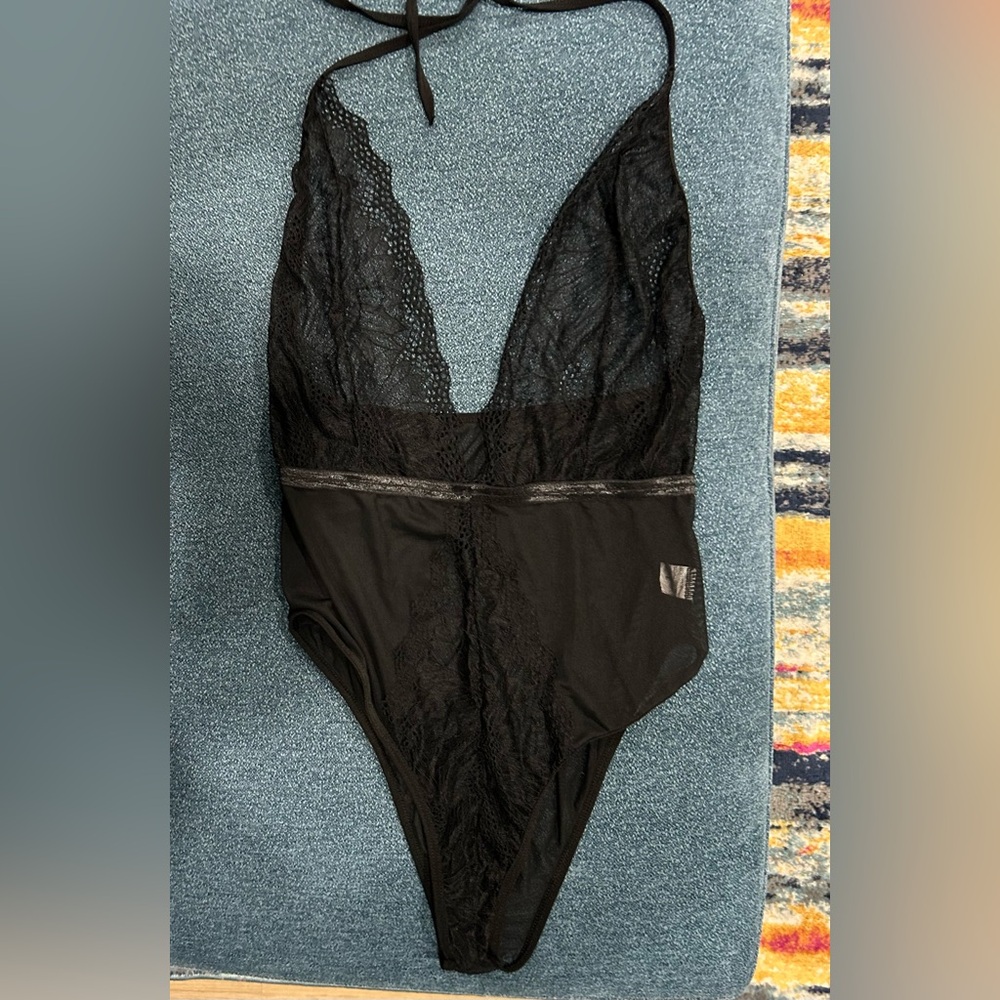 Black lacy/mesh bodysuit